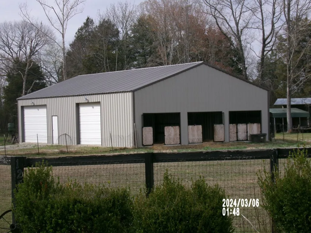 40’x60’x18’ Stable with 2 14x14 roll up doorsRed iron column frame
26 gauge roof
26 gauge wallsWickliff KY approx location
2-14’x14’ roll up door
3” roof and wall insulation insulation
1-3070 steel walk doors
3- 12x10 openings on endwall