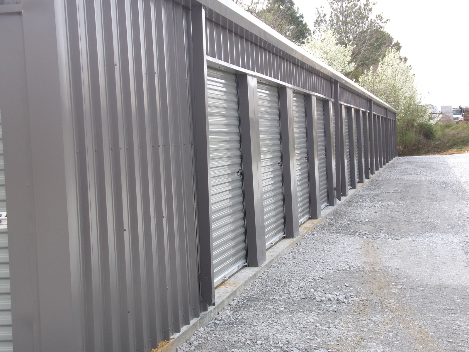 mini self Storage building50’x210’x8’-6”’
Cold form frame
29 gauge roof
26 gauge walls
Gutters and downspouts

Maryville Tennessee  approx  location
26-8’’x 7’’ roll up door
2” roof  insulation insulation
1-4070 steel walk doors
