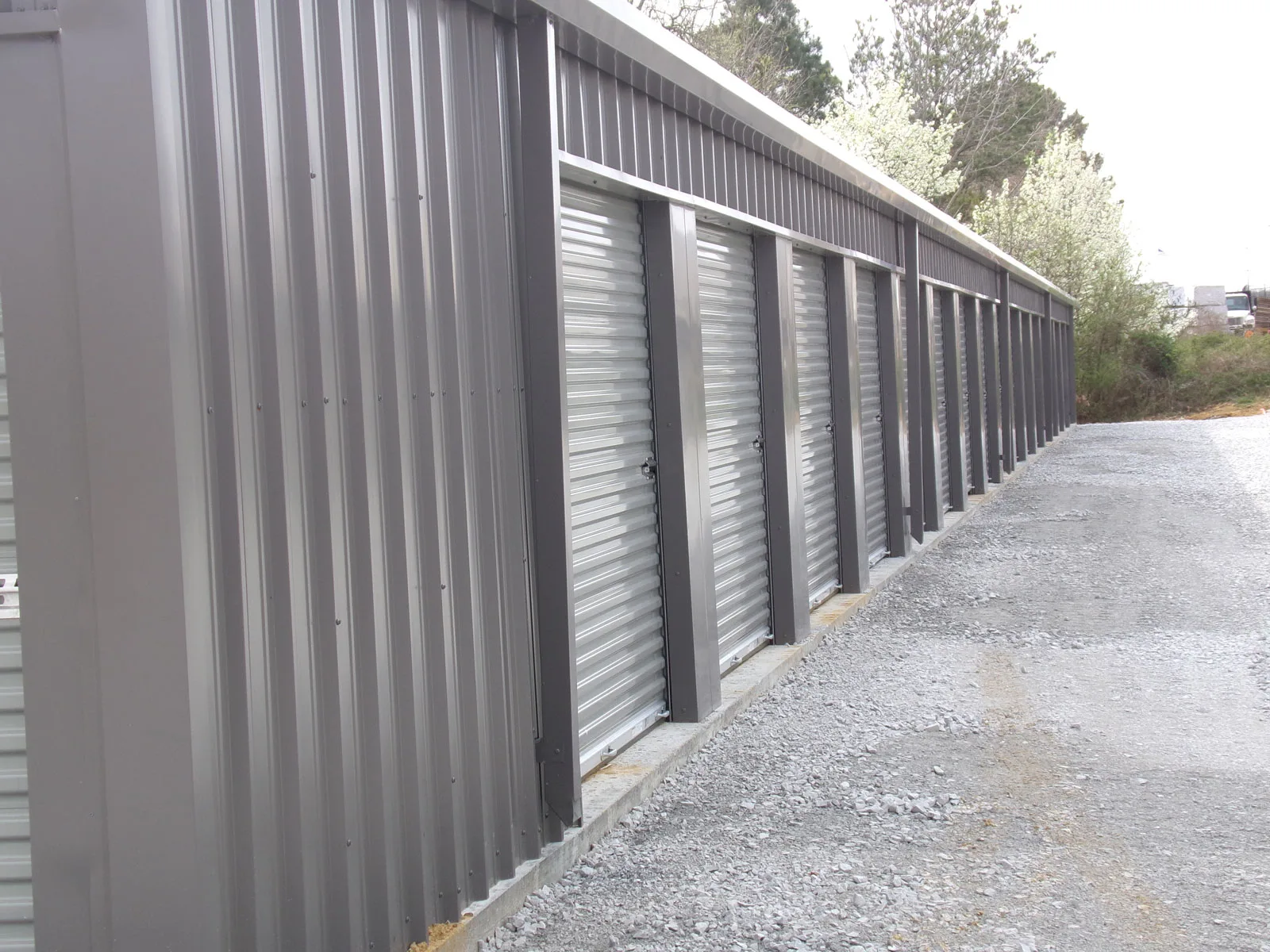 mini self Storage building50’x210’x8’-6”’
Cold form frame
29 gauge roof
26 gauge walls
Gutters and downspoutsMaryville Tennessee approx location
26-8’’x 7’’ roll up door
2” roof insulation insulation
1-4070 steel walk doors