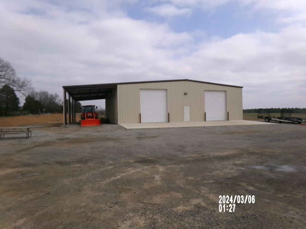 Barn garage with lean
50’x100’x16’ with 20’x100’ open wall lean to
Red iron column frame
26 gauge roof
26 gauge walls
Gutters and downspouts

Camden mississippi approx  location
2-14’x14’ roll up door
3” roof and wall insulation insulation
1-3070 steel walk doors