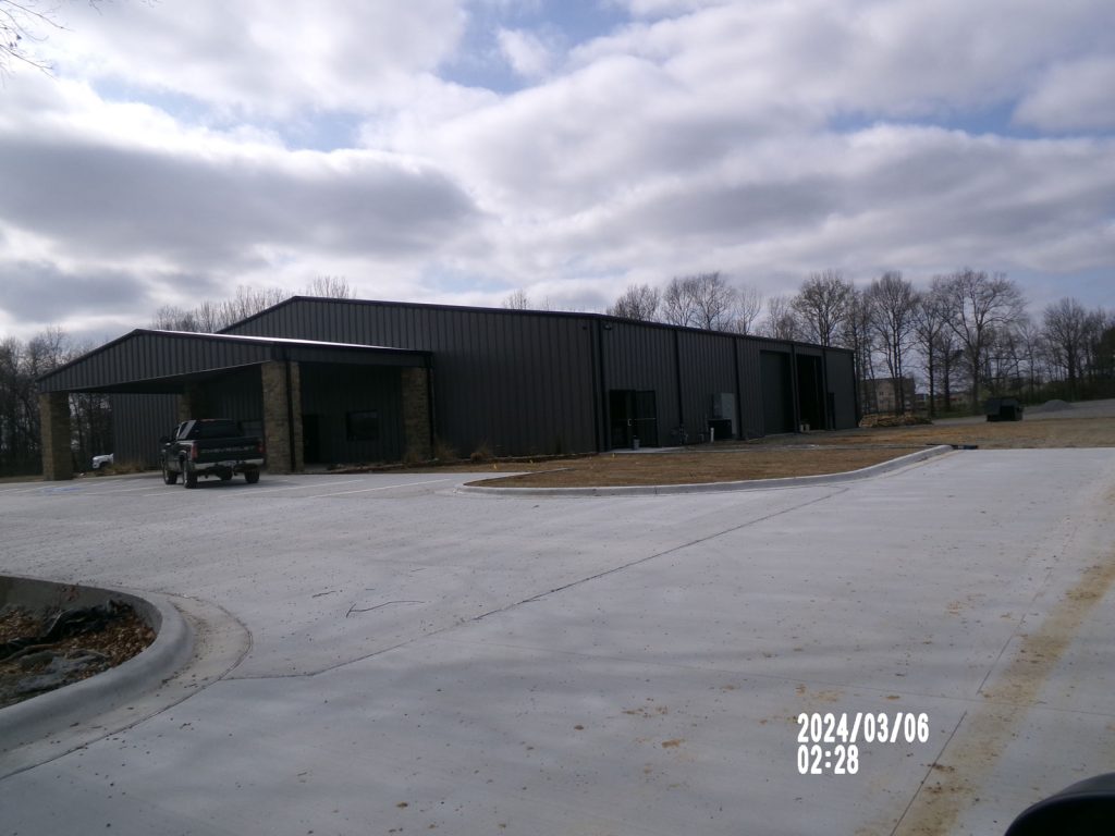 Shop office garage
75’x150’x16’ with 40’x20’x14’ drive thru 
Red iron  frame
26 gauge roof
26 gauge walls
Gutters and downspouts

Effingham ill approx  location
4-14’x14’ roll up door
3” roof and wall insulation insulation
2-3070 steel walk doors