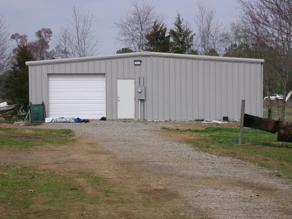 gray-storage-building-with-garage
Work shop
Red iron column frame
26 gauge roof
26 gauge walls
Gutters and downspoutsWichita kansas approx location
1-12’x12’ roll up door
3” roof and wall insulation insulation
1-3070 steel walk doors