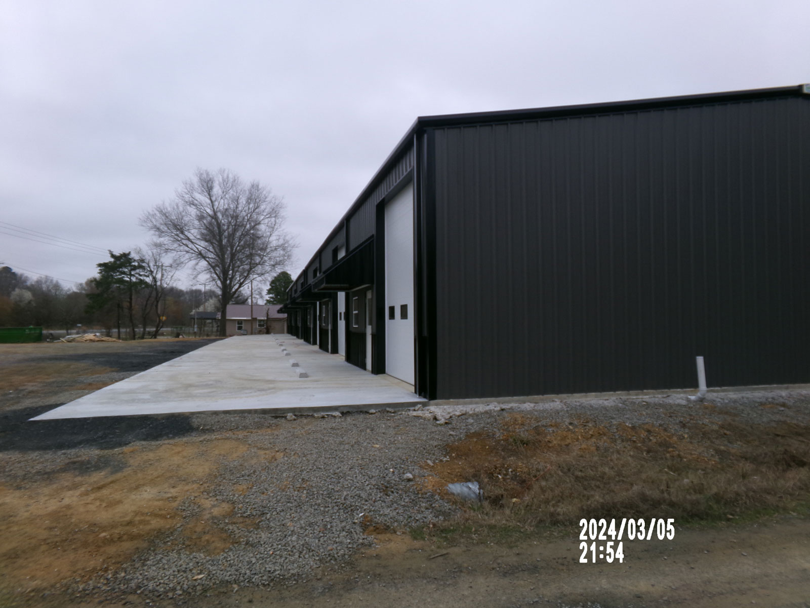 charcoal metal buildingShop and offices 60’x200’x16’ Red iron column frame 26 gauge roof 26 gauge walls Gutters and downspouts Monroe La approx location 12-14’x14’ roll up door 3” roof and wall insulation insulation 6-3070 steel walk doors